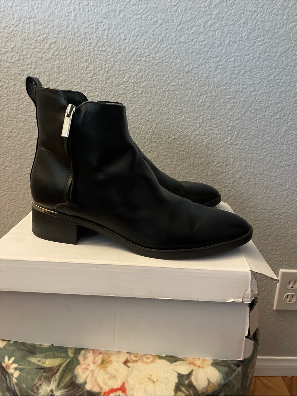 Calvin Klein Black Leather Ankle Booties with Side Zip Accent